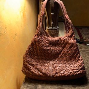 A beautiful light brown Italian soft leather bag with plenty of space inside